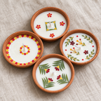 Medium Soy Wax Diyas with Flower Petals, Set of 4, close-up of the wax top
