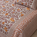 Rust Floral Bedsheet Set, close-up of the print, border and pillow cover