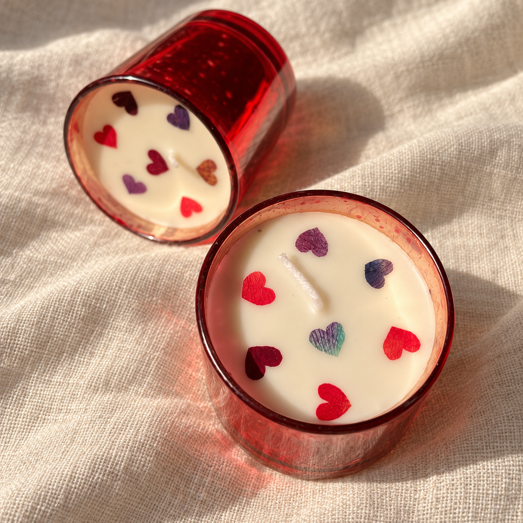 Red Soy Wax Candles with Dried-Rose Hearts, Set of 2, close-up of the wax top