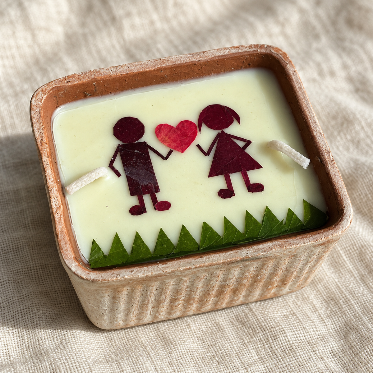 Love Candle, Couple, Dried Rose in Terracotta, close-up of the wax top