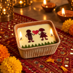Love Candle, Couple, Dried Rose in Terracotta, lit for Diwali on a mirror-work runner