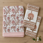 Pink Floral Vine Bedsheet Set, folded with its pillow covers