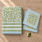 Yellow Green Floral Bedsheet Set, folded with its pillow covers