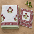 Maroon Floral Buta Bedsheet Set, folded with its pillow covers