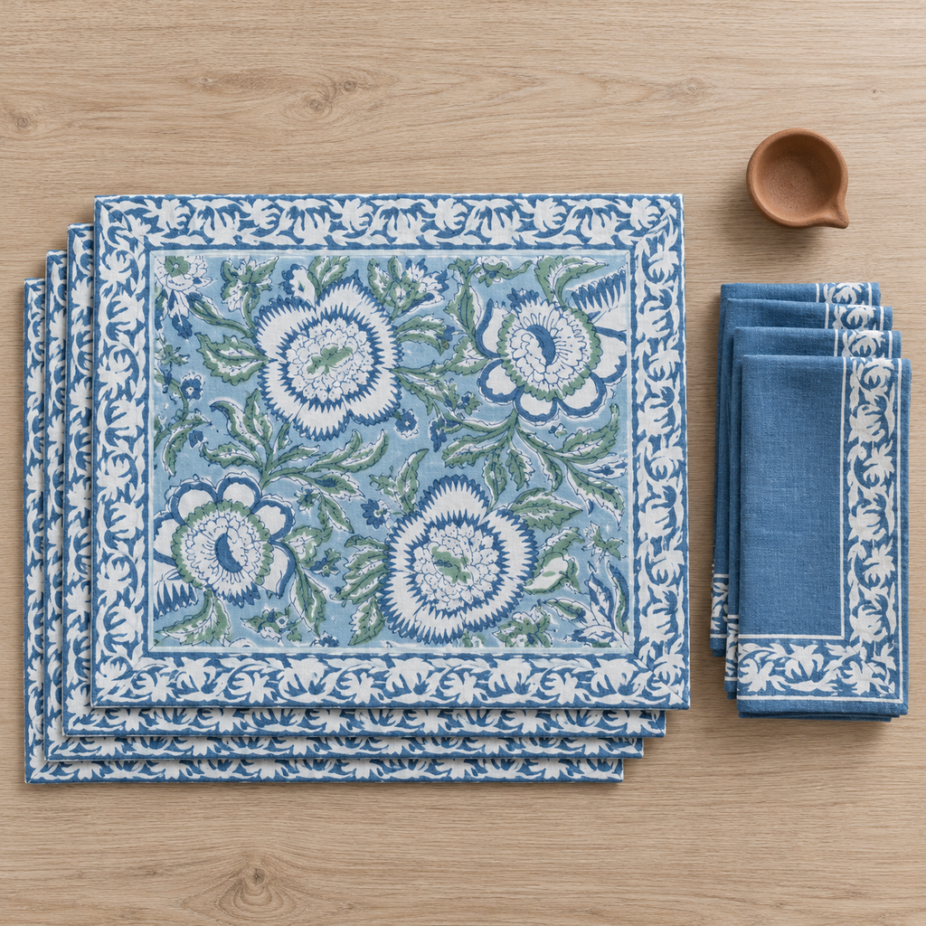 Light Blue Floral Placemat and Napkin Set of 12, placemats and napkins stacked, seen from above