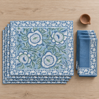 Light Blue Floral Placemat and Napkin Set of 12, placemats and napkins stacked, seen from above