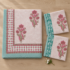 Pink Floral Buta Bedsheet Set, folded with its pillow covers