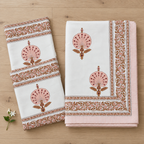 Pink Peacock Motif Bedsheet Set, folded with its pillow covers