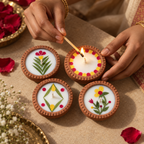 Small Soy Wax Diyas with Flower Petals, Set of 4, being lit by hand