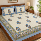 Blue Floral Buta Bedsheet Set, on a made double bed in a bright bedroom