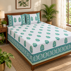Emerald Green Floral Bedsheet Set, on a made double bed in a bright bedroom