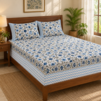 Blue Zigzag Floral Bedsheet Set, on a made double bed in a bright bedroom