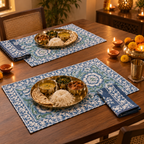 Light Blue Floral Placemat and Napkin Set of 12, set for a Diwali meal with brass thalis and diyas